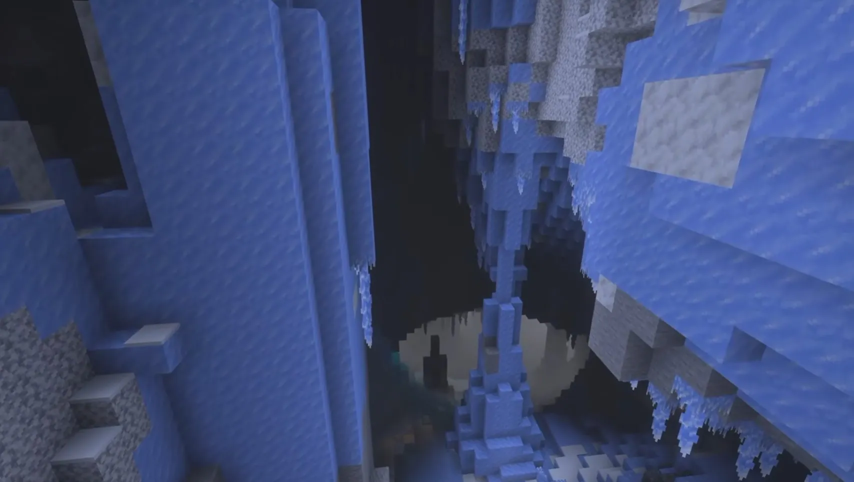 Głęboka przepaść Ice Caves z lodowymi stalaktytami i kryształami w Minecrafcie