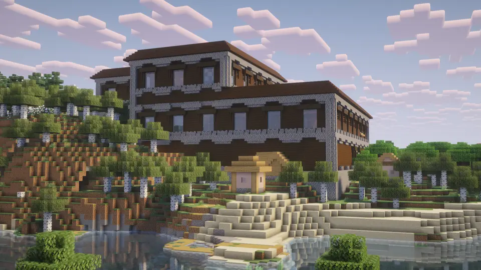 Zrzut ekranu seeda Woodland Mansion z wioską w środku tuż przy spawnie