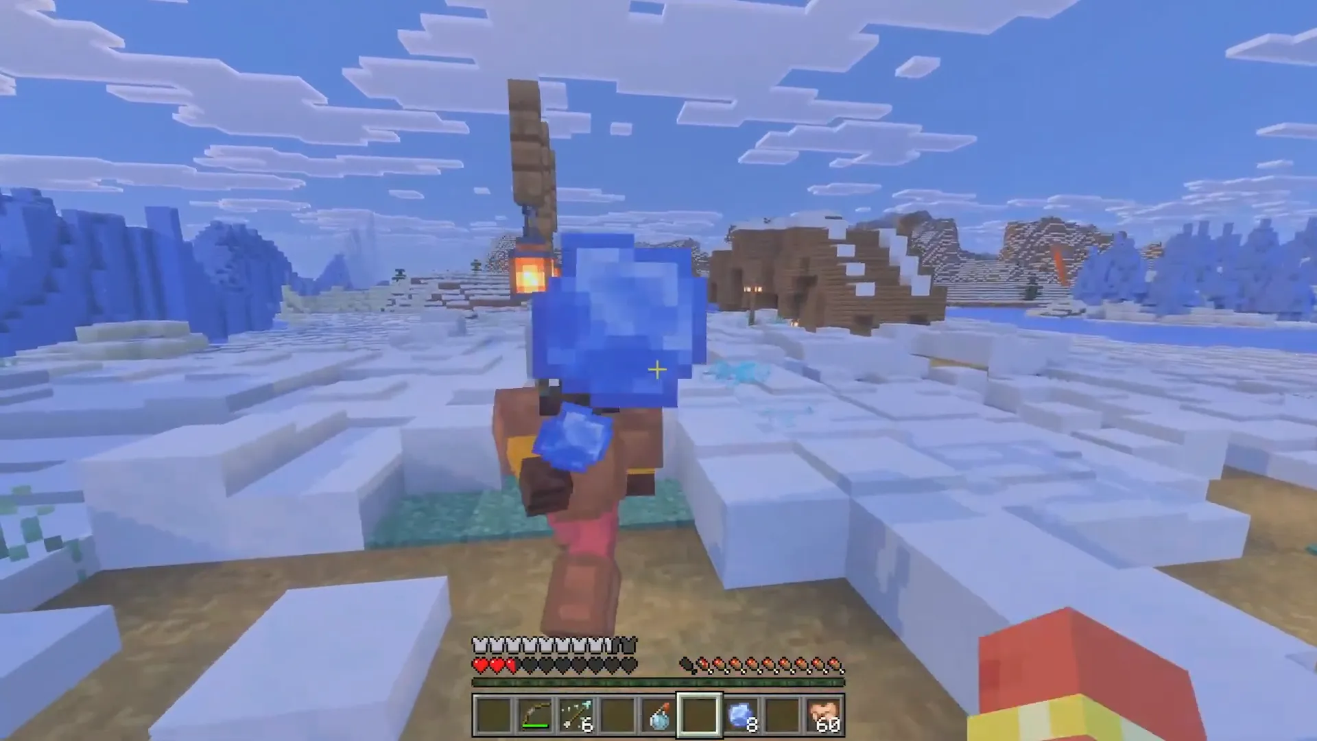 Gracz rzuca lodową kulą z efektem zamrożenia w ośnieżonym biomie Minecraft, Ice Caves